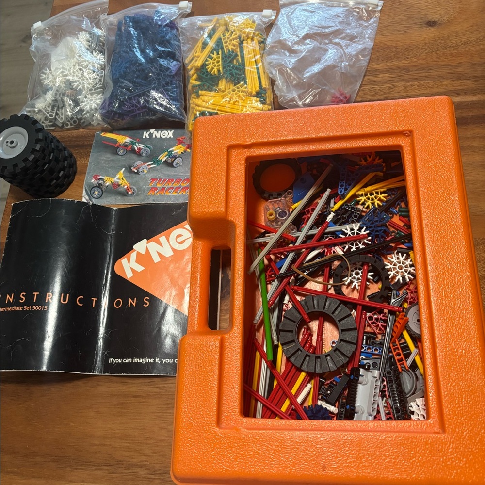 Vintage 1992 K'NEX Building Set with Orange Storage Case and booklet with extras